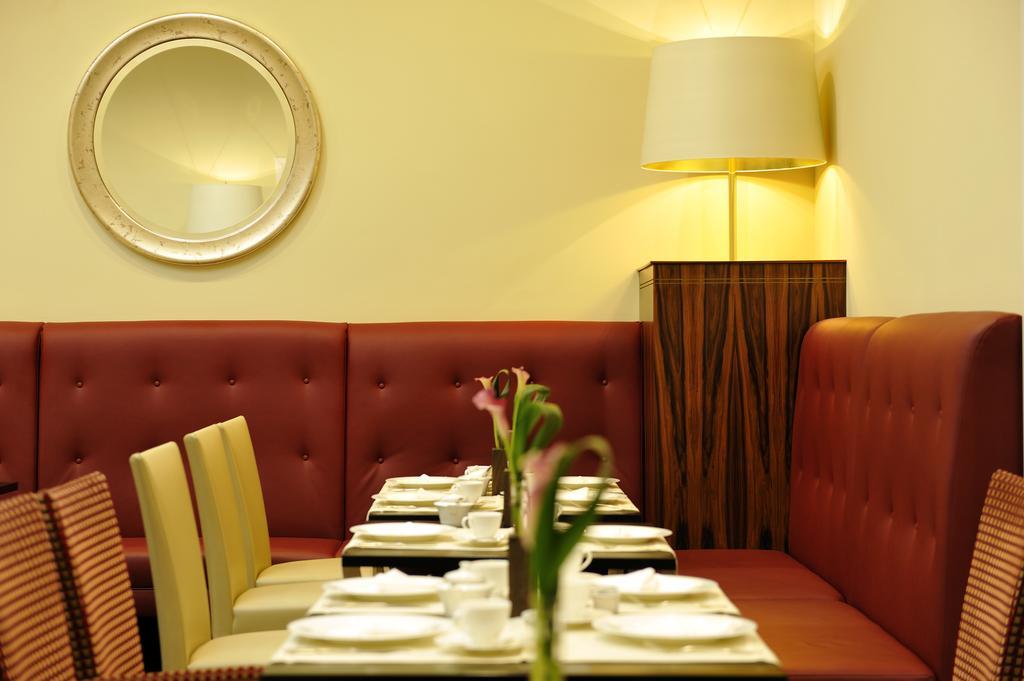 Kastens Hotel Luisenhof Hanover Exterior photo Restaurant interior